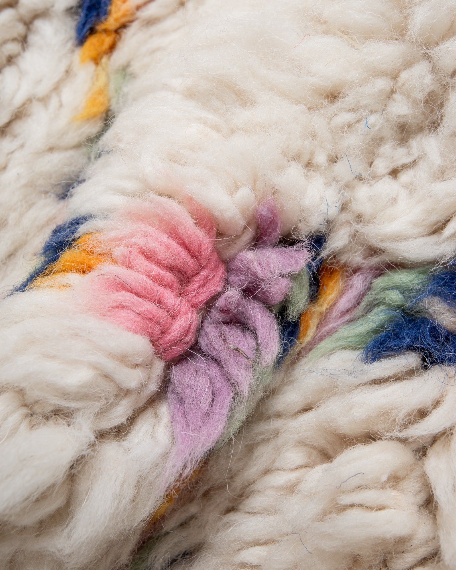 Modern, designer, handcrafted Berber rug from Morocco. Beniourain carpet with beautiful colours and patterns and fluffy wool texture.